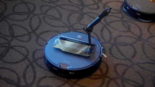 Roborock's Latest Mechanical Arm Robot Vacuum Revolutionizes Cleaning at CES 2025